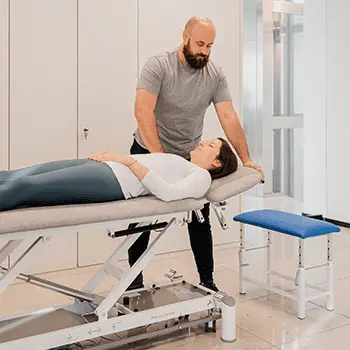 Physiotherapist during application