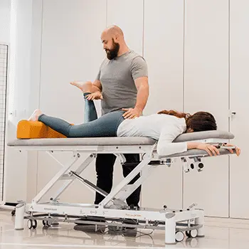 Physiotherapist during application