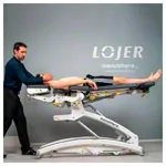 Image shows Lojer therapy table Manuthera 242 with 2 engines