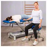 Image shows Saddle stool with cushion, exclusive with wheels