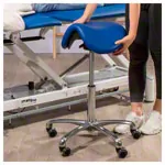 Image shows Saddle stool with cushion, exclusive with wheels