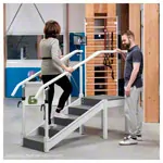 Exercise staircase with adjustable handrails, corner section