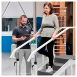 Exercise staircase with adjustable handrails, corner section