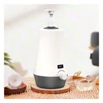 Image shows massage oil warmer, single, incl. dispenser bottle