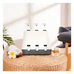 Image shows Massage oil warmer, 3-way, incl. 3 dispenser bottles