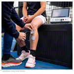 Image shows Gymna Elexeo ultrasound therapy control unit with large and small ultrasound probe
